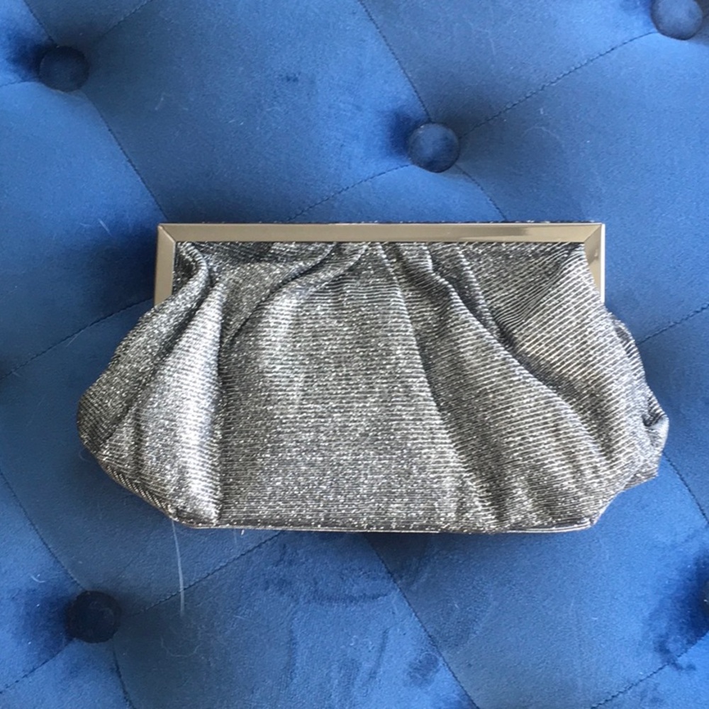 Silver tone evening purse, detachable chain.